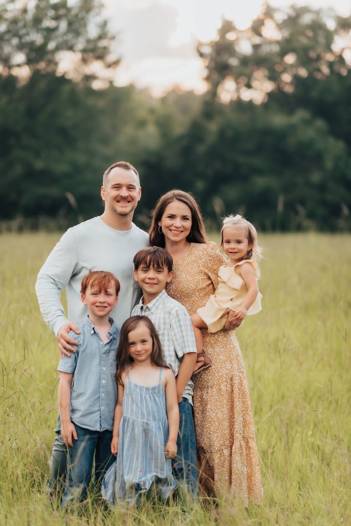 phillips-230 The Phillips Family pictured on their land near the home Carroll Construction helped Design and Build