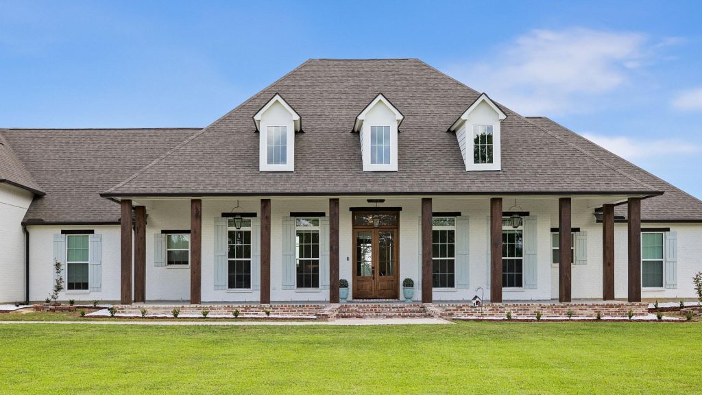 project__0004_necker-mast-0 Front Elevation Custom home in East Feliciana by Carroll Construction for the Necker Family. Creole French Style Home.