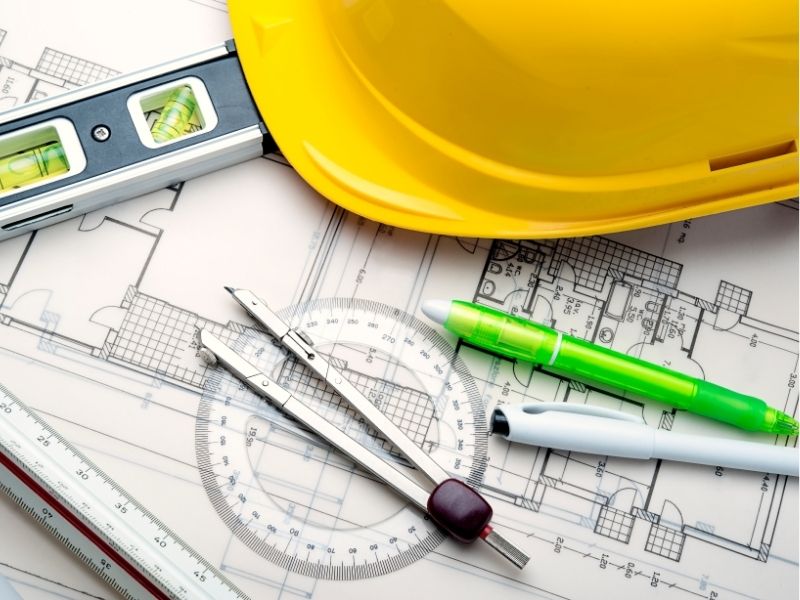 Tools of the trade 800x600 Blueprints and hardhats. Tools of the trade for preparing to build for our clients.