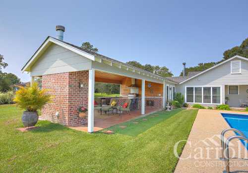 Construction of a custom outdoor entertaining pool area
