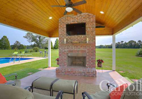 Built in outdoor brick fireplace for entertaining