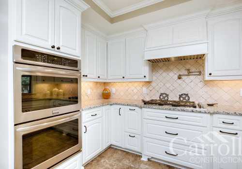 Added custom cabinets, granite counter tops, stainless appliances