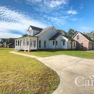 Wide Exterior View of Hebert Home