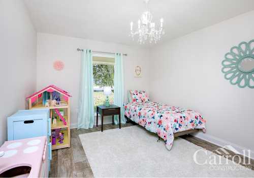 Feminine and functional bedroom with a view