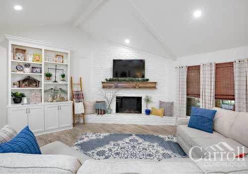 The spacious family room with vaulted ceiling and custom entertainment center