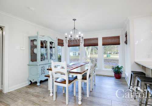 Bright dining area inside the new house by Carroll Construction