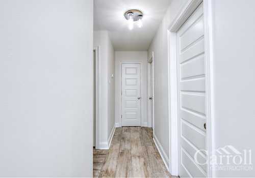 Long hallway connecting each large bedroom