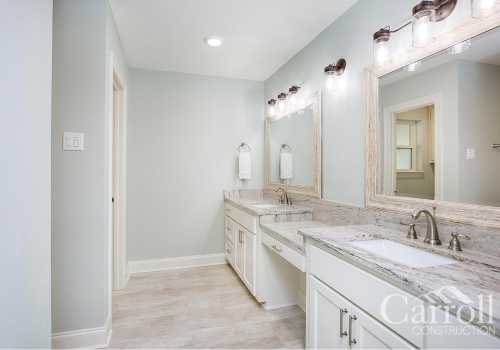 Extra large master bathroom with dual vanity stations and granite counters